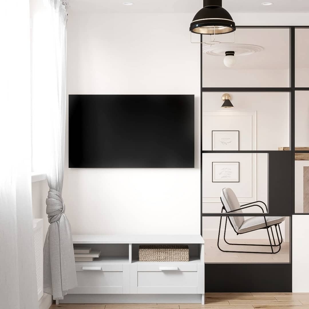 Modern monochrome living room with a wall-mounted flat-screen TV