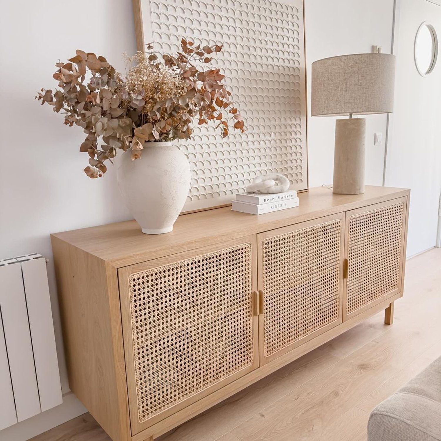 Scandinavian-inspired living room sideboard with natural textures and neutral tones