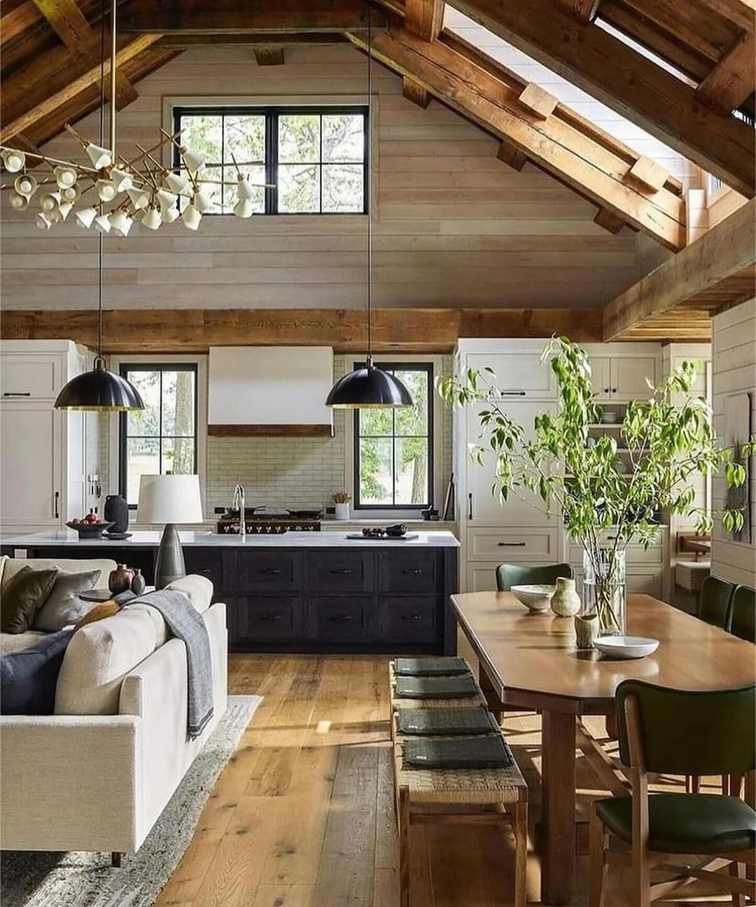 A cozy and inviting open-plan living space combining rustic charm with modern amenities