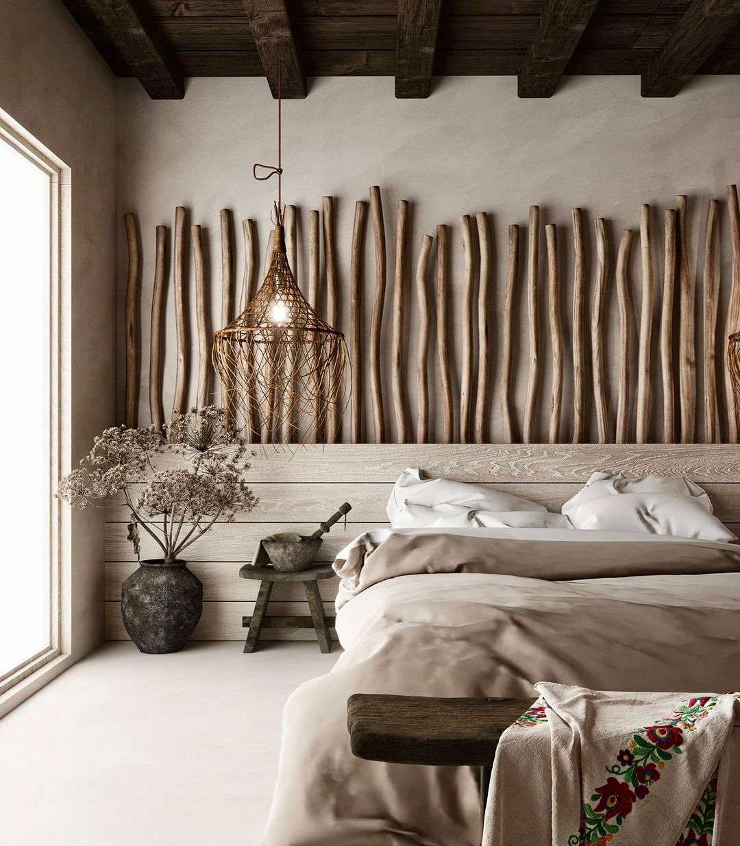 A rustic-style bedroom design featuring a wooden beam ceiling and a wall adorned with large, decorative wooden sticks