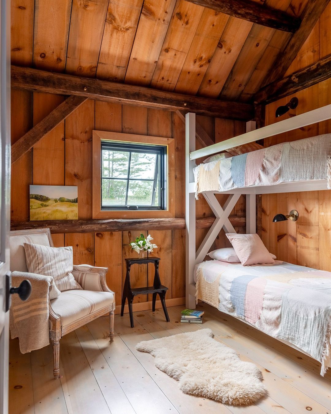 Cozy cabin-style bedroom with natural wood finish