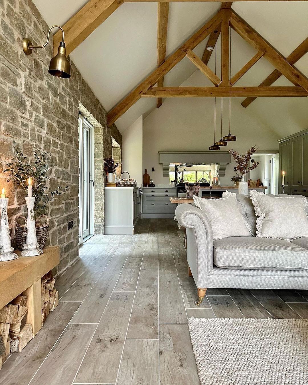 Rustic chic living room with exposed beams and stone walls