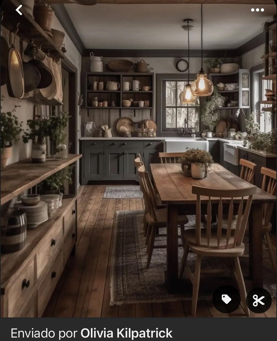 A rustic kitchen with warm wood tones and grey cabinetry