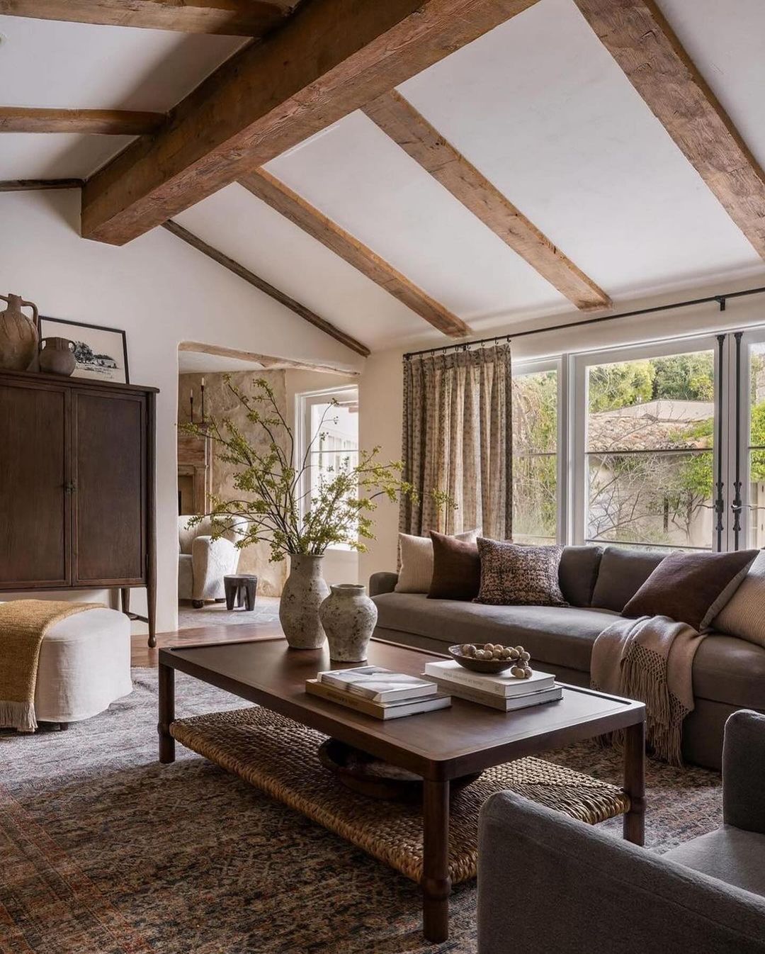 Cozy and rustic living room with exposed wooden beams