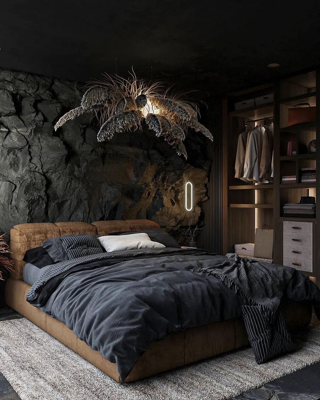 A unique bedroom with an earthy cave-like texture and striking modern lighting