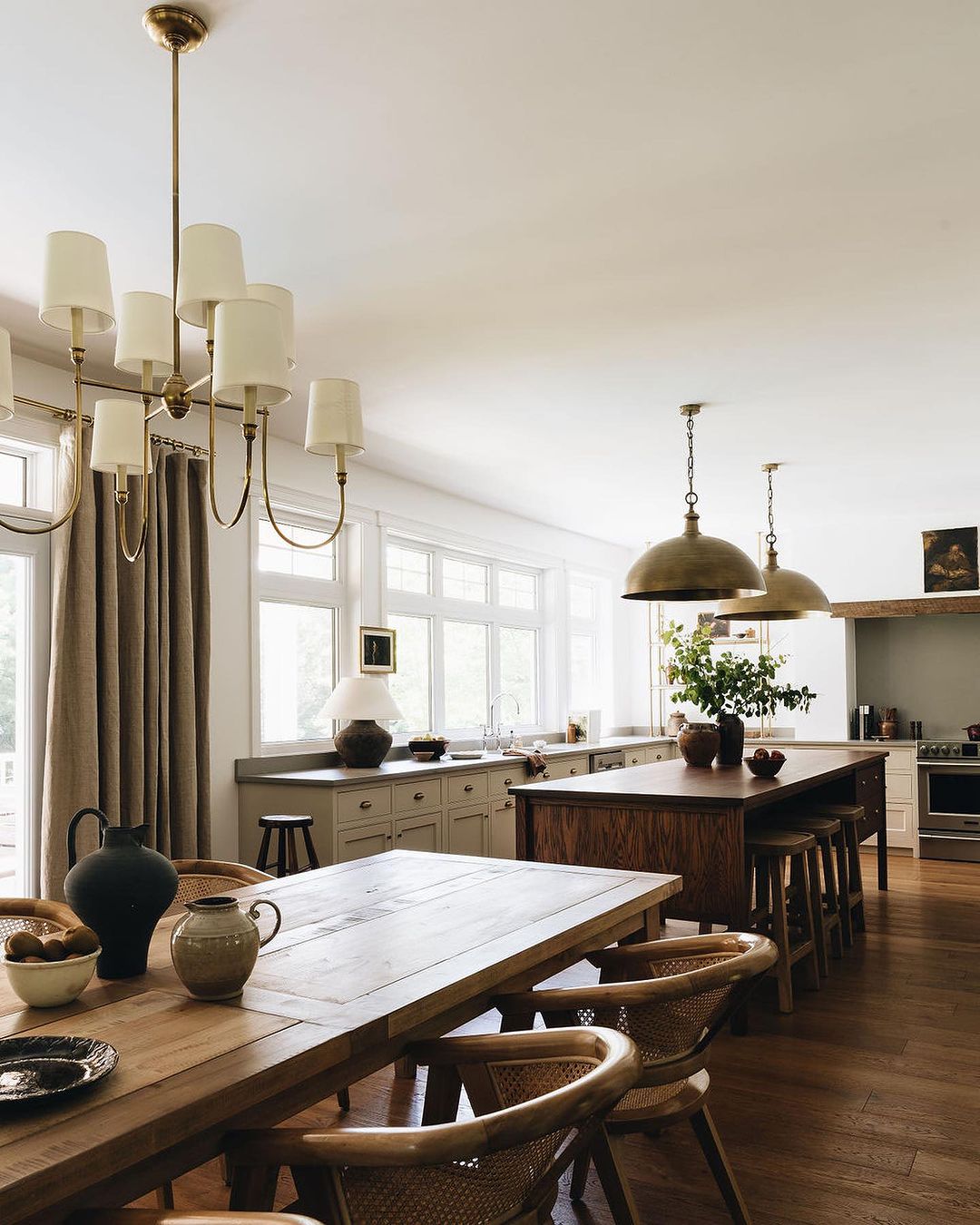 A warm and inviting kitchen with a blend of rustic wooden furnishings and modern amenities