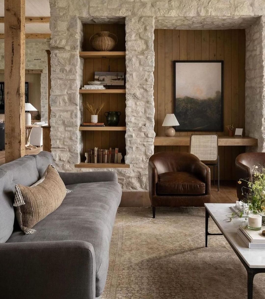 A rustic yet modern living room with natural textures and materials