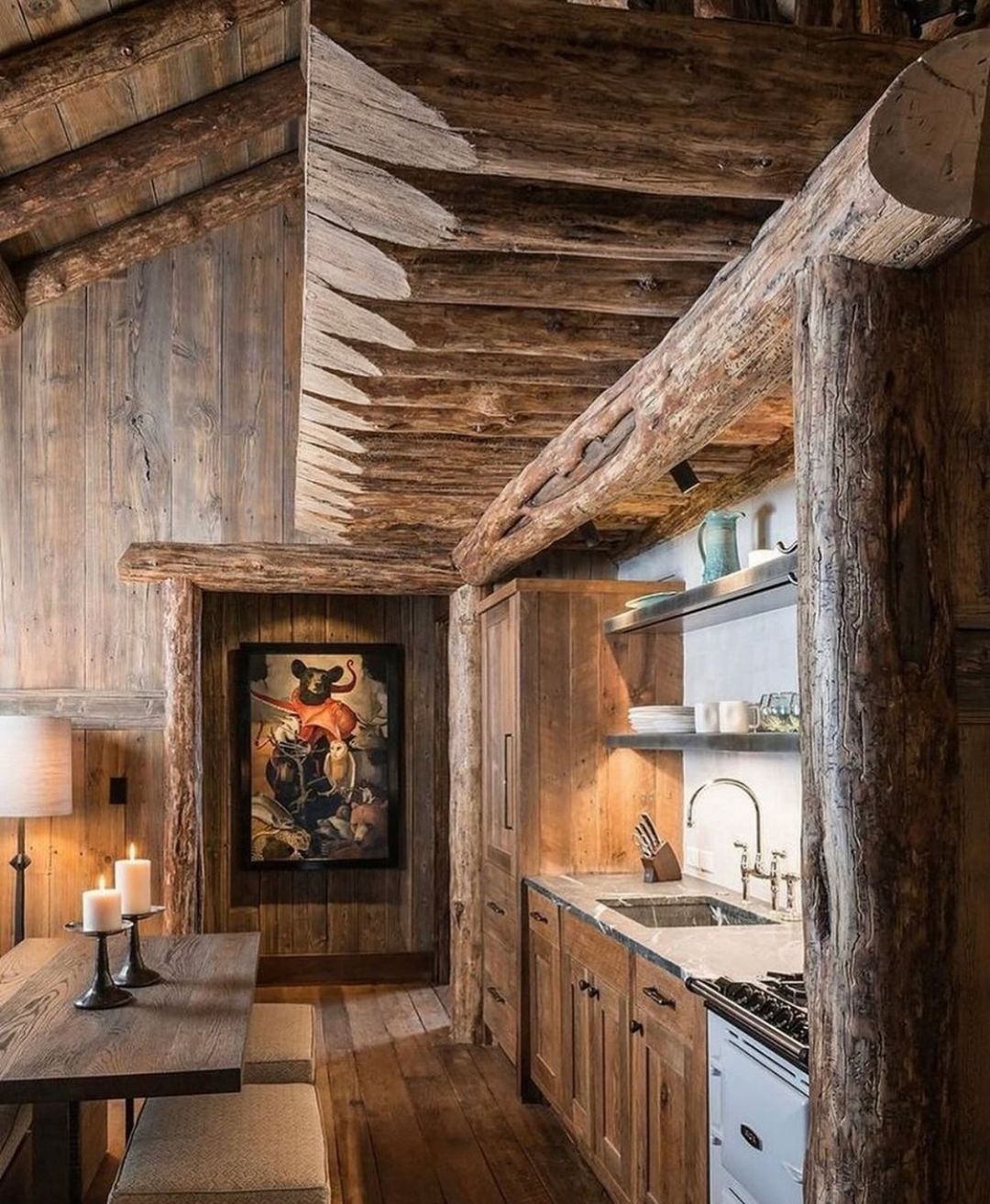 A rustic wooden kitchen with exposed beams and cabinets