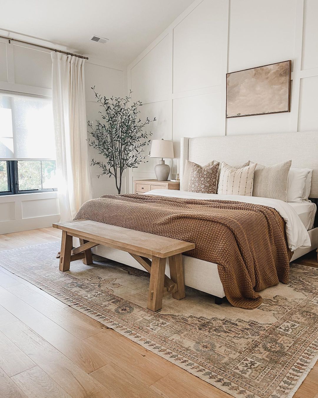 A serene and harmonious bedroom with well-coordinated textures and calm tones