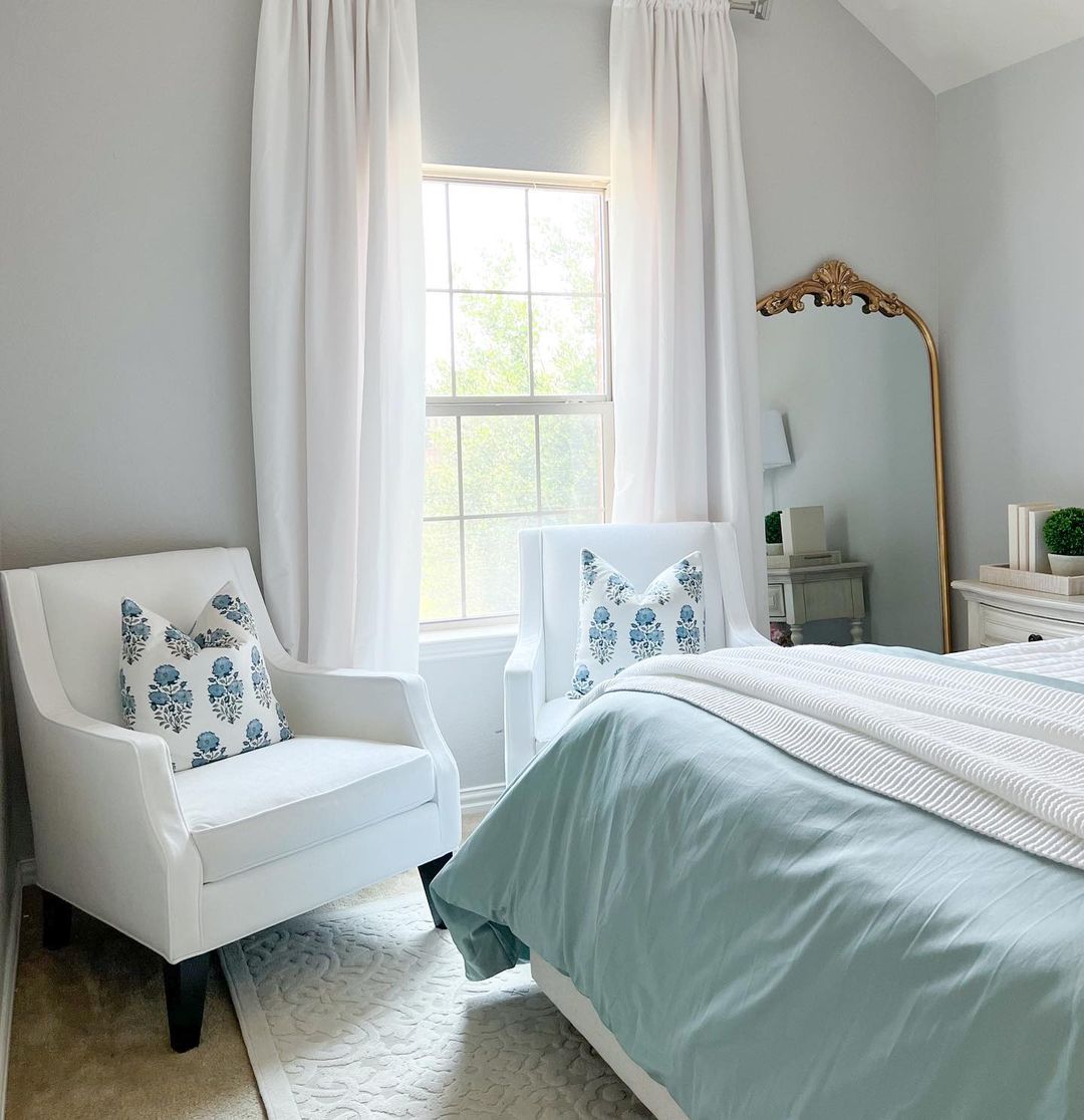 A serene and inviting bedroom with a touch of botanical charm