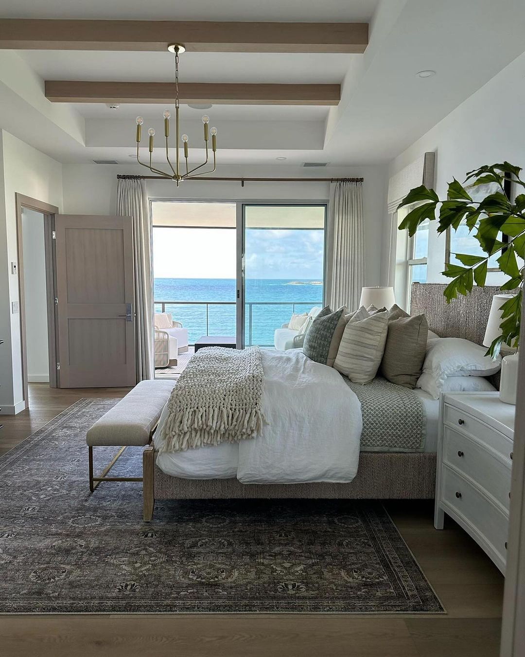 Coastal-inspired bedroom with ocean view