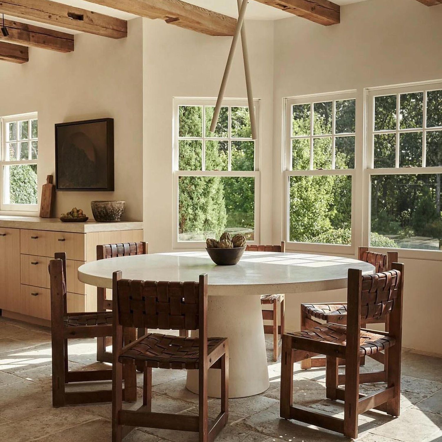 A serene dining area with abundant natural light