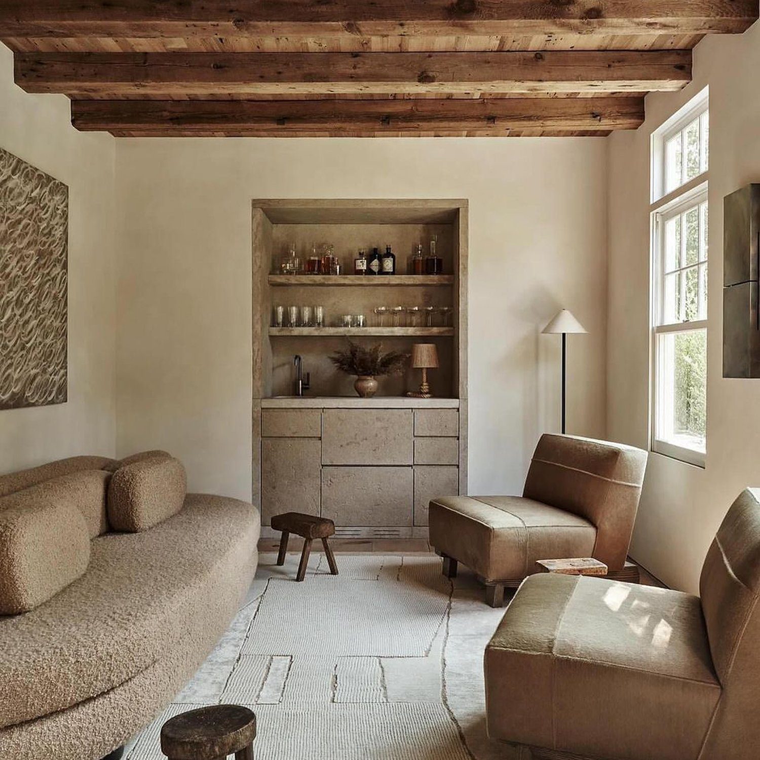 A serene living room featuring exposed wooden beams and minimalist furniture