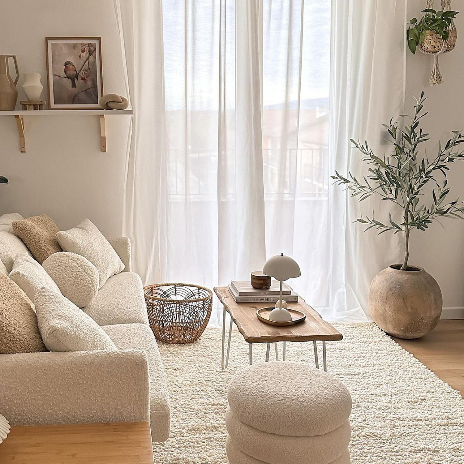 A serene and stylish living room with a cozy textured sofa