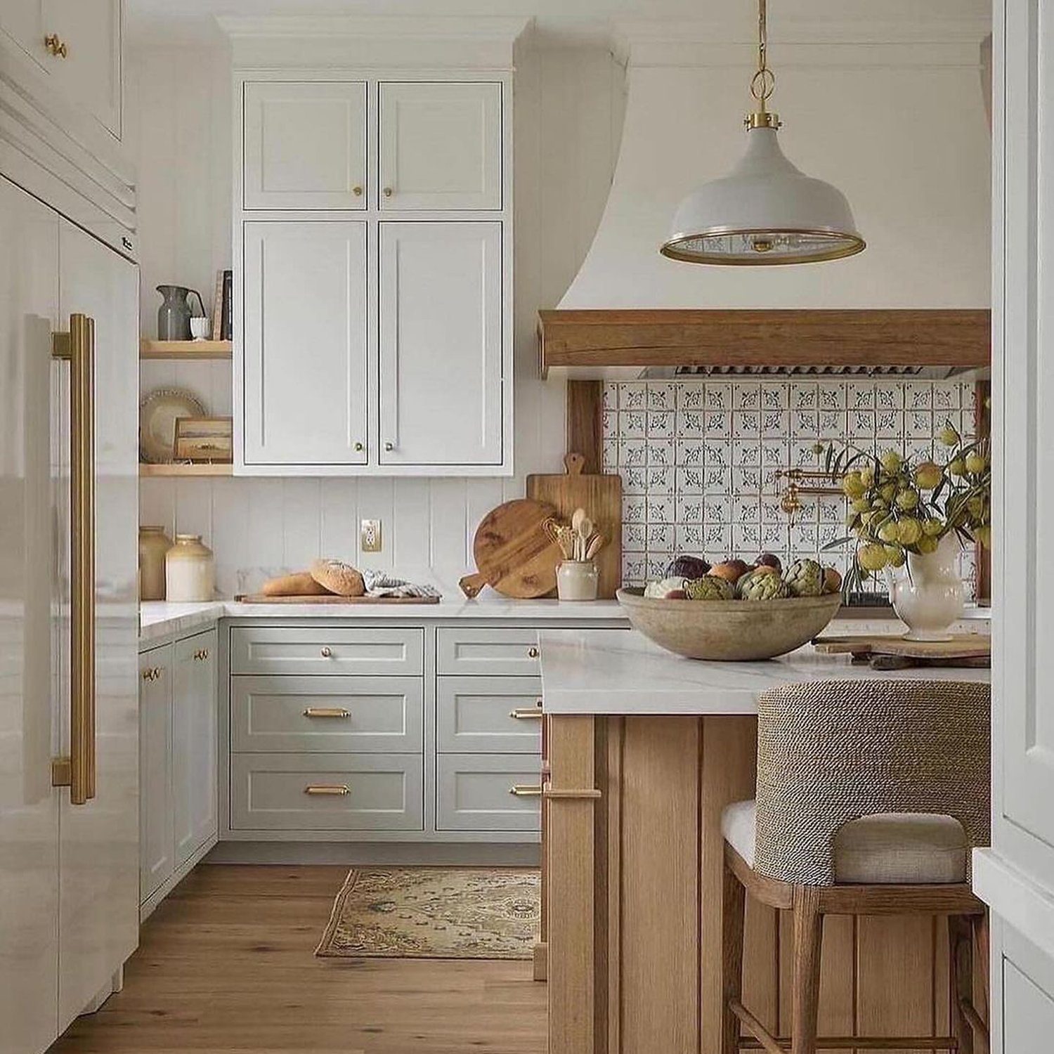 Elegantly designed kitchen space with patterned backsplash