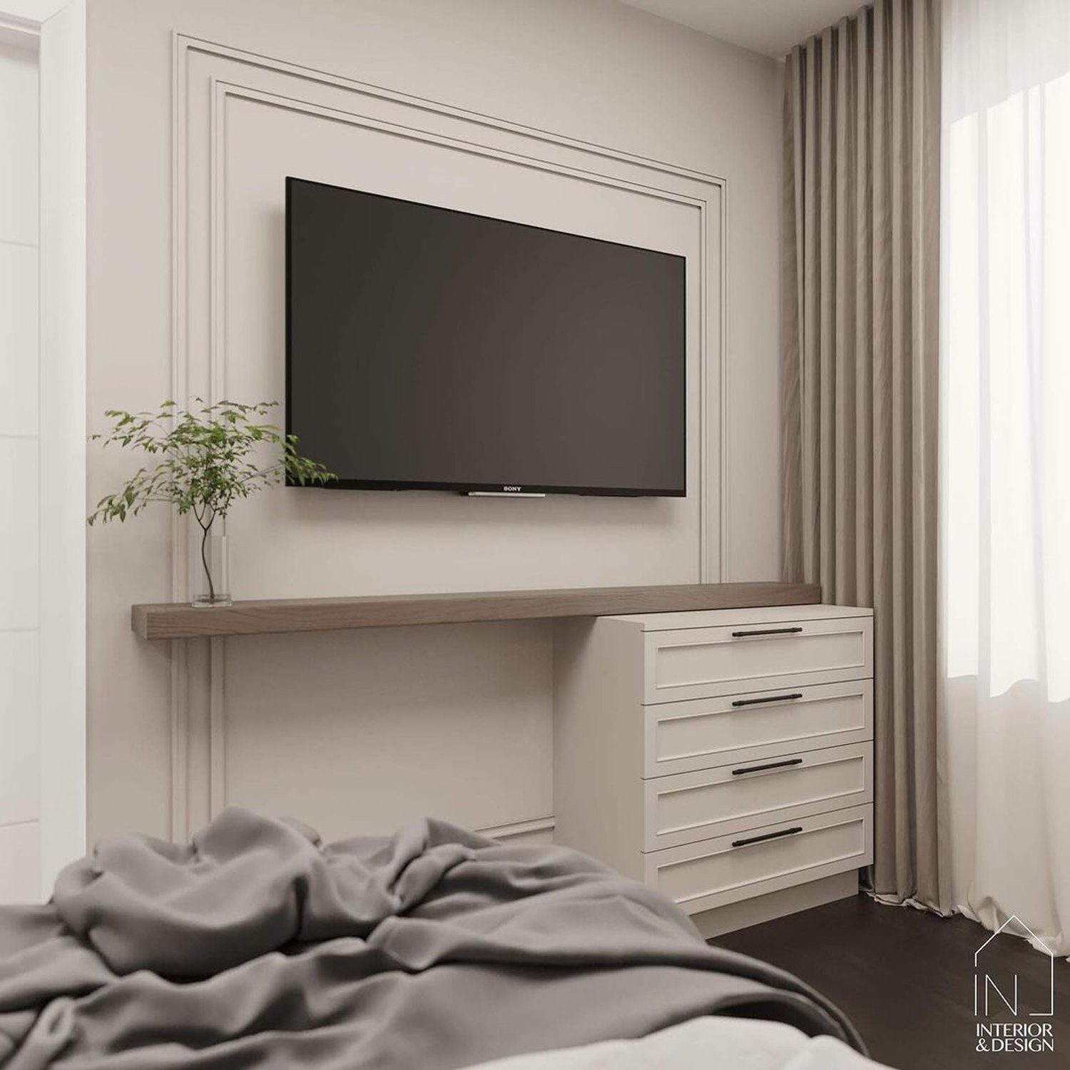 An elegantly minimal bedroom with a wall-mounted TV