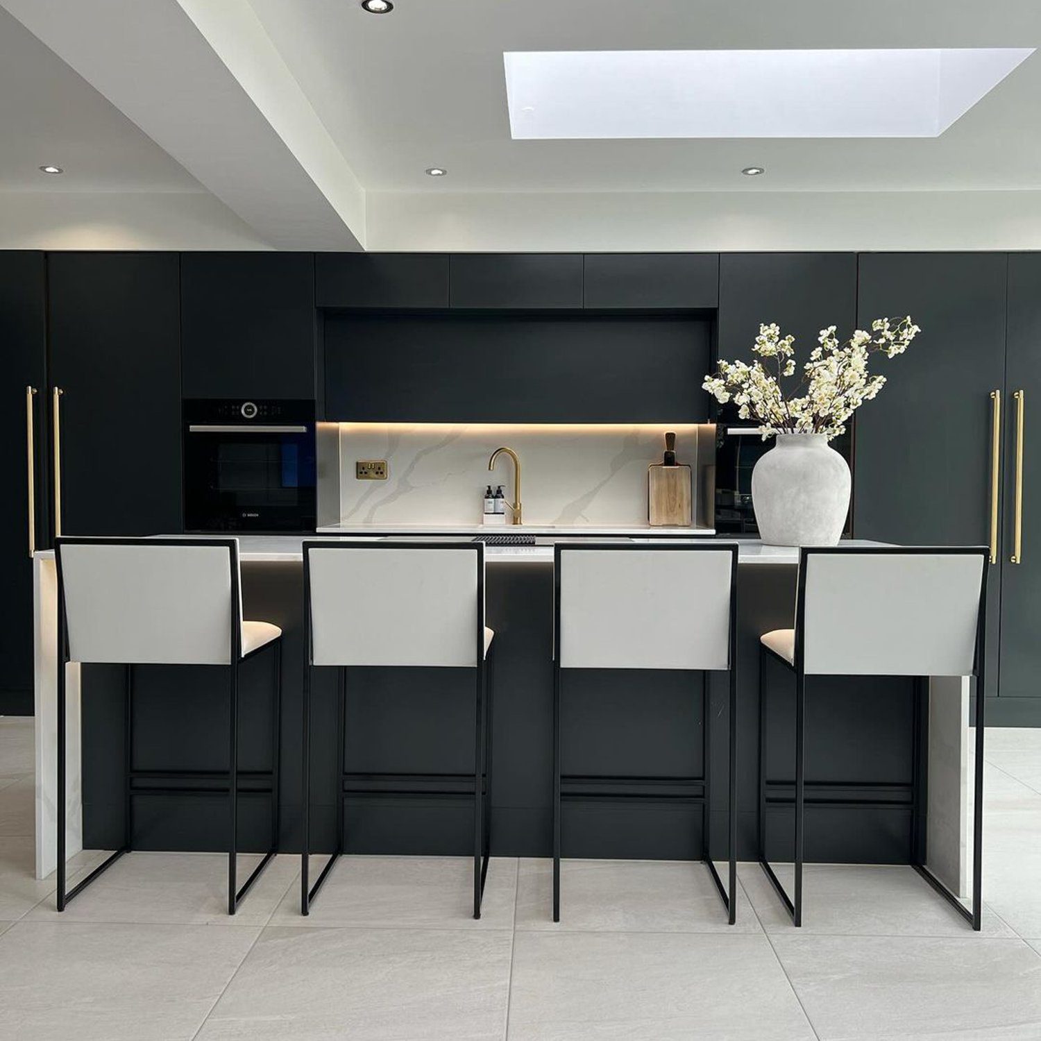 Modern kitchen with sleek black cabinetry