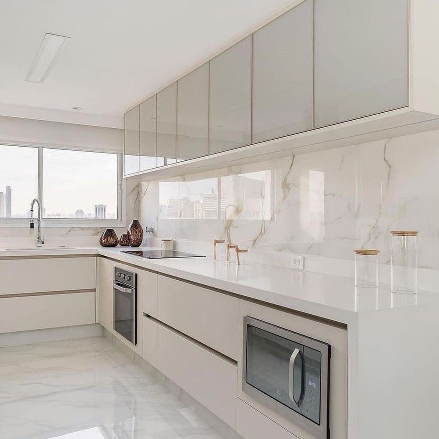 Modern minimalist kitchen with a marble motif