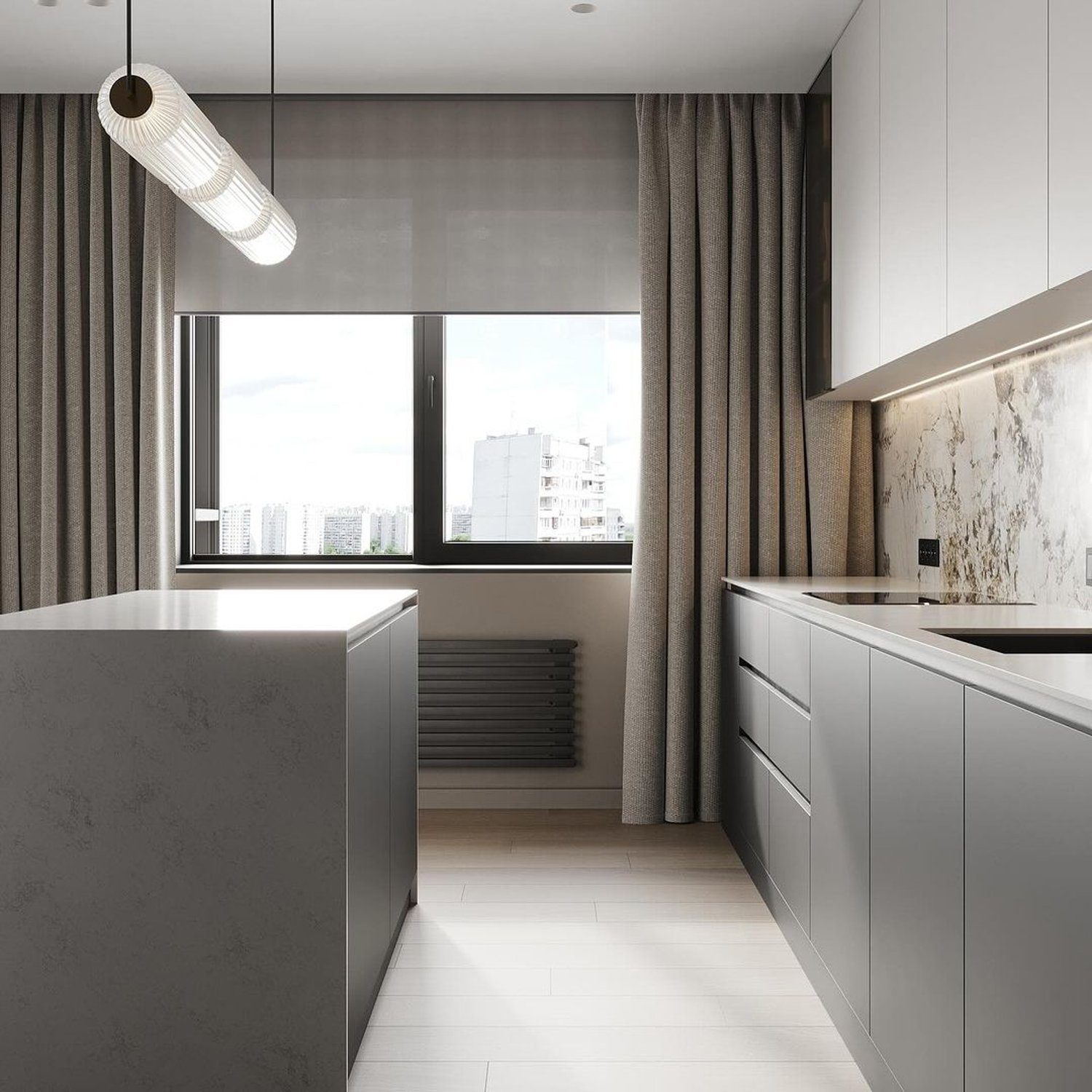 A modern kitchen with minimalist design featuring sleek gray cabinets, marble backsplash, and large windows