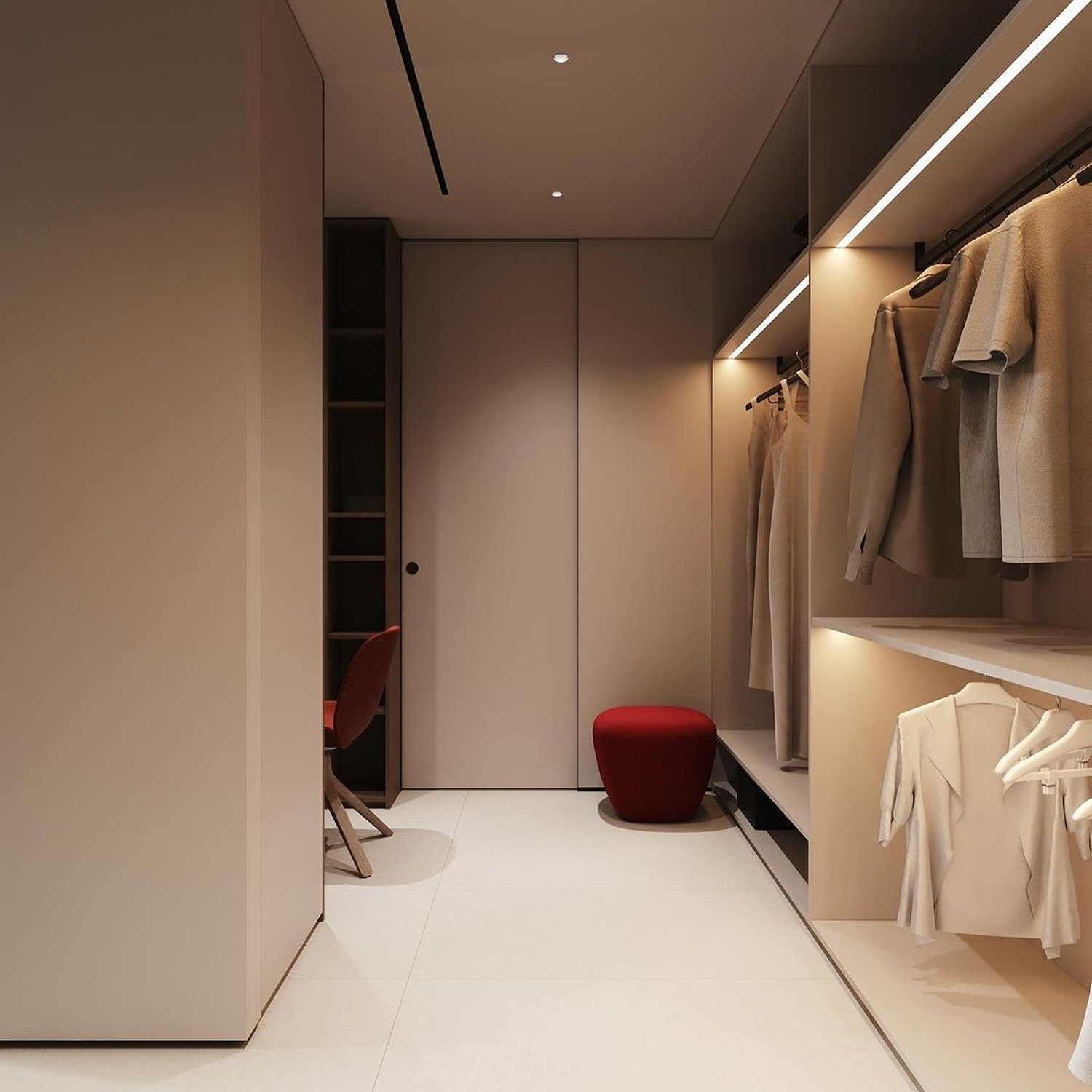 A modern minimalist walk-in closet with streamlined design and mood lighting