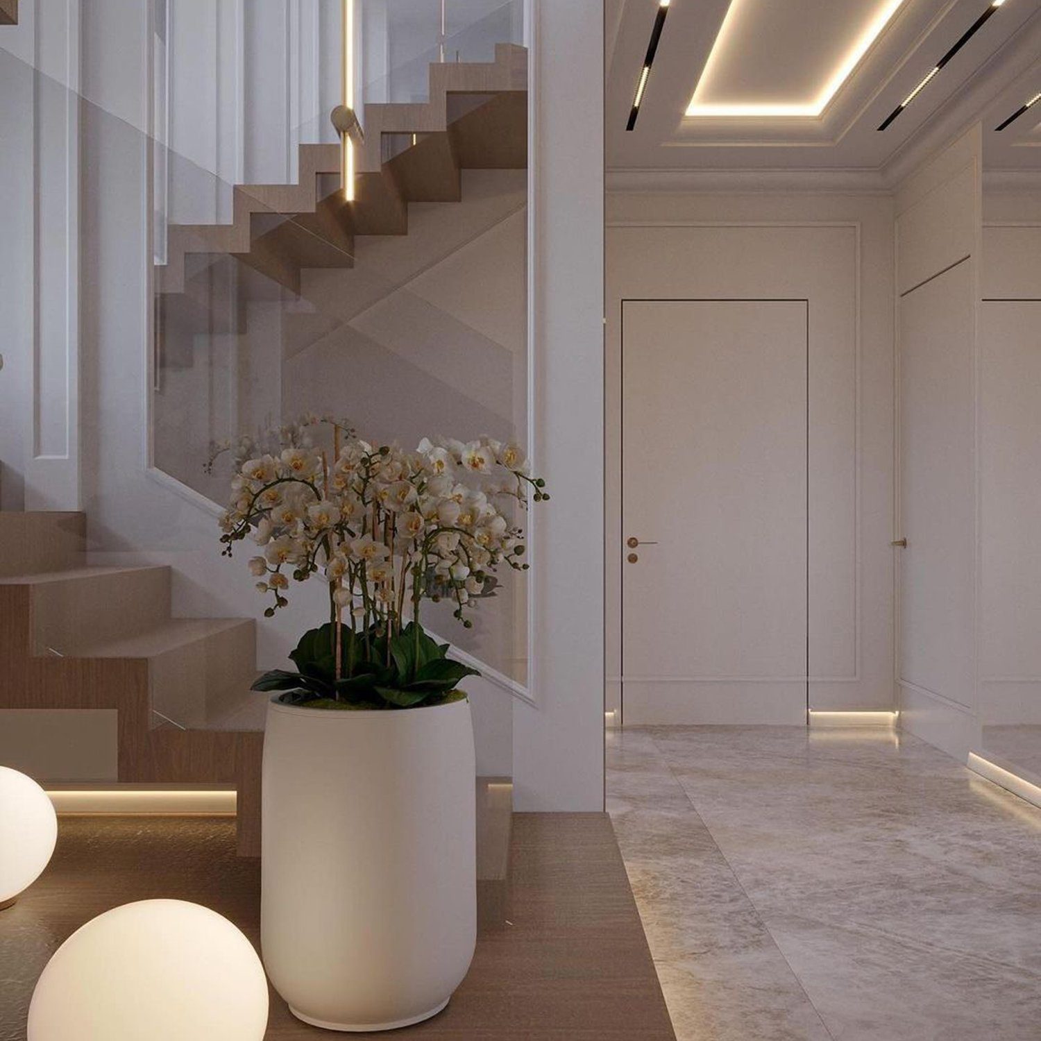 A modern and minimalist staircase design with a blend of clean lines and warm lighting.