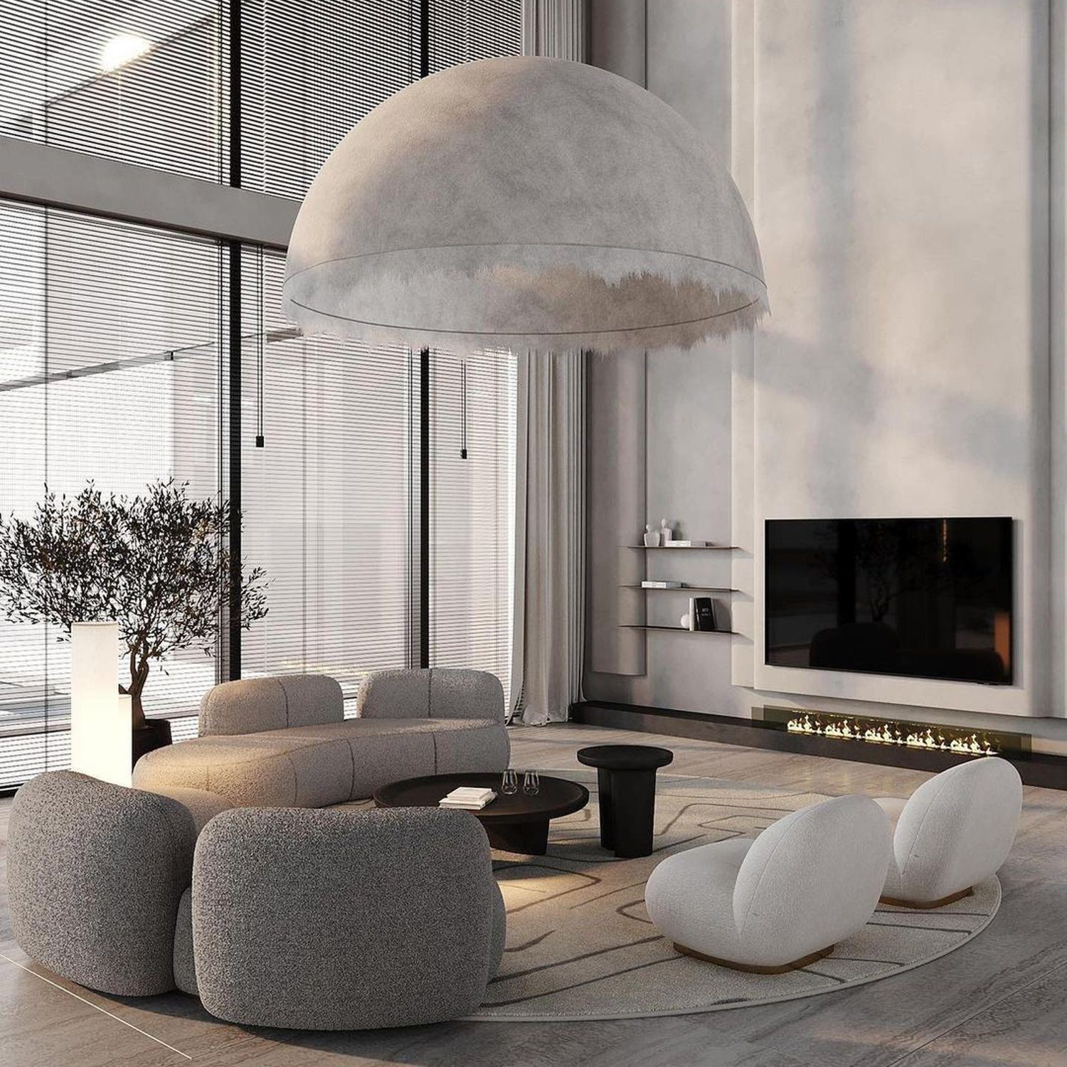 Minimalist living room design featuring a unique oversized pendant light