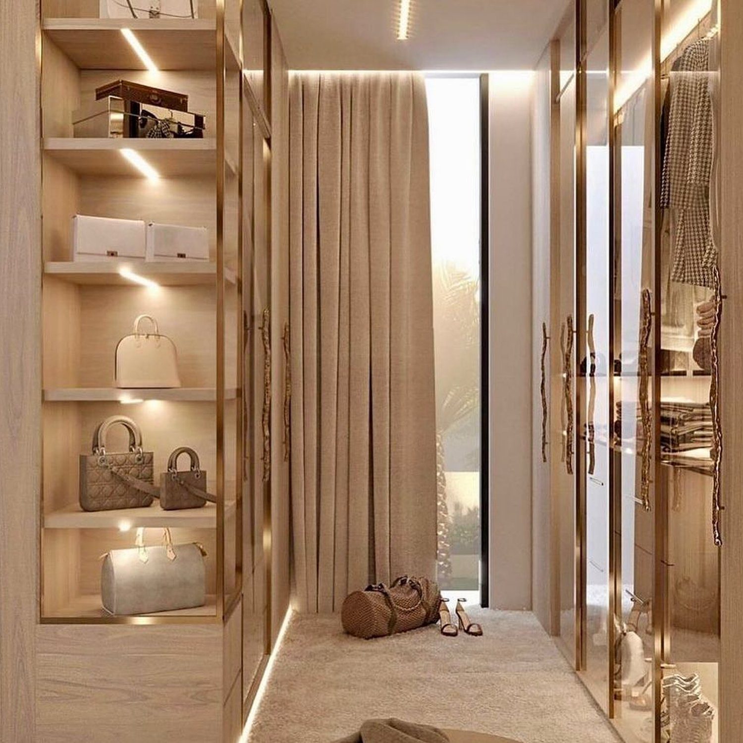 Elegant walk-in closet with warm lighting