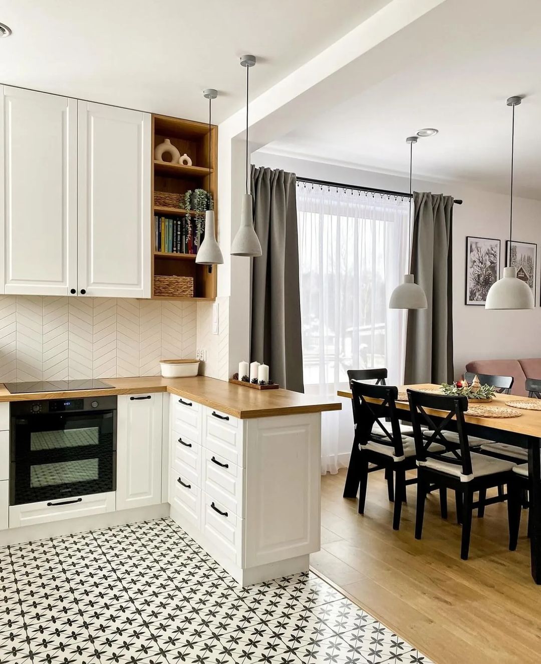 Stylish modern kitchen with patterned floor tiles