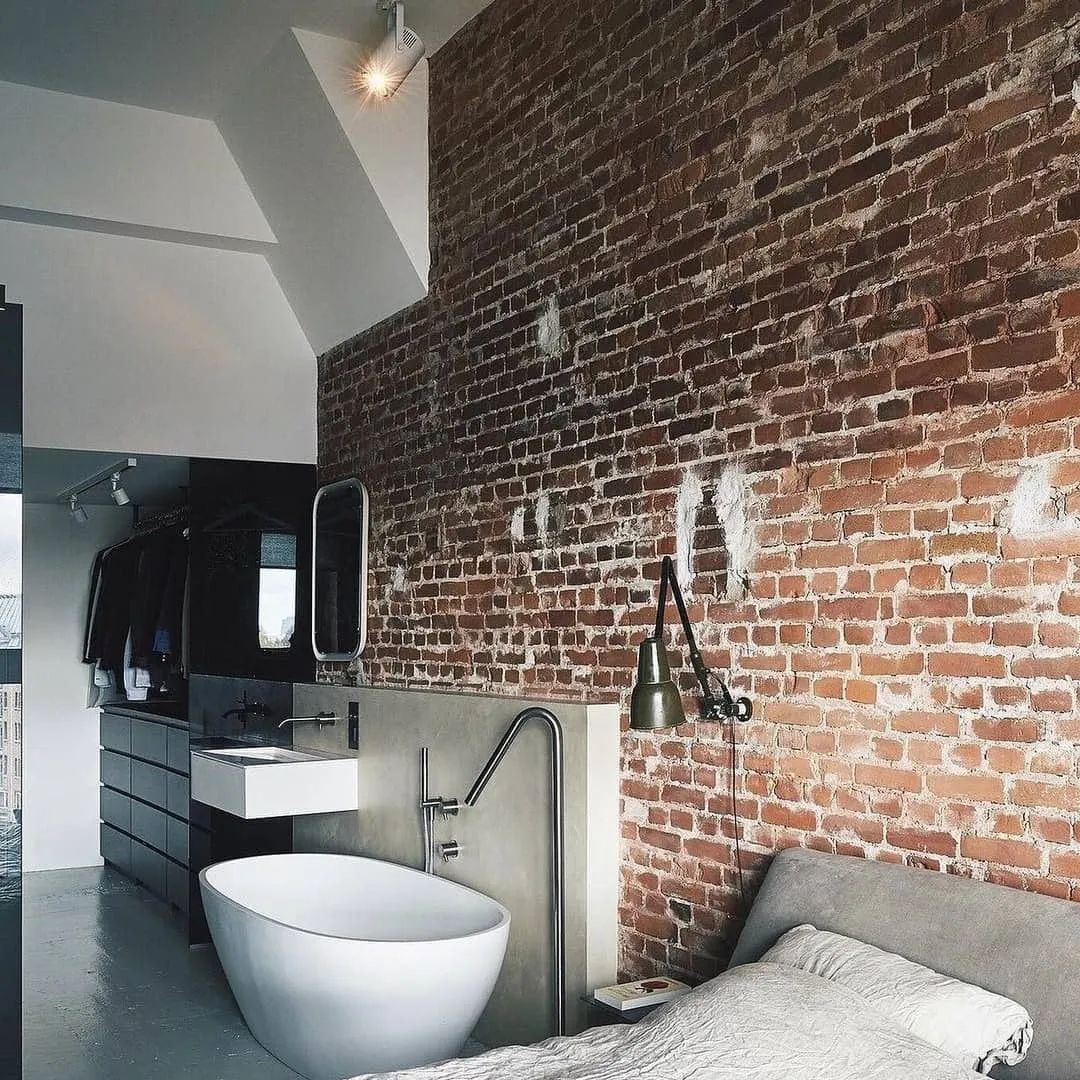 Unique Urban Bathroom with Exposed Brick Wall and Mixed Fixtures