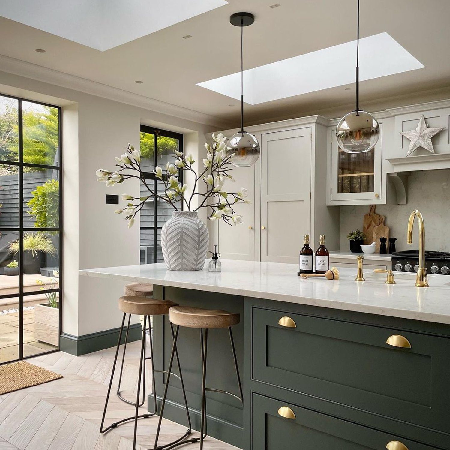 A sleek and modern kitchen featuring an elegant mix of materials