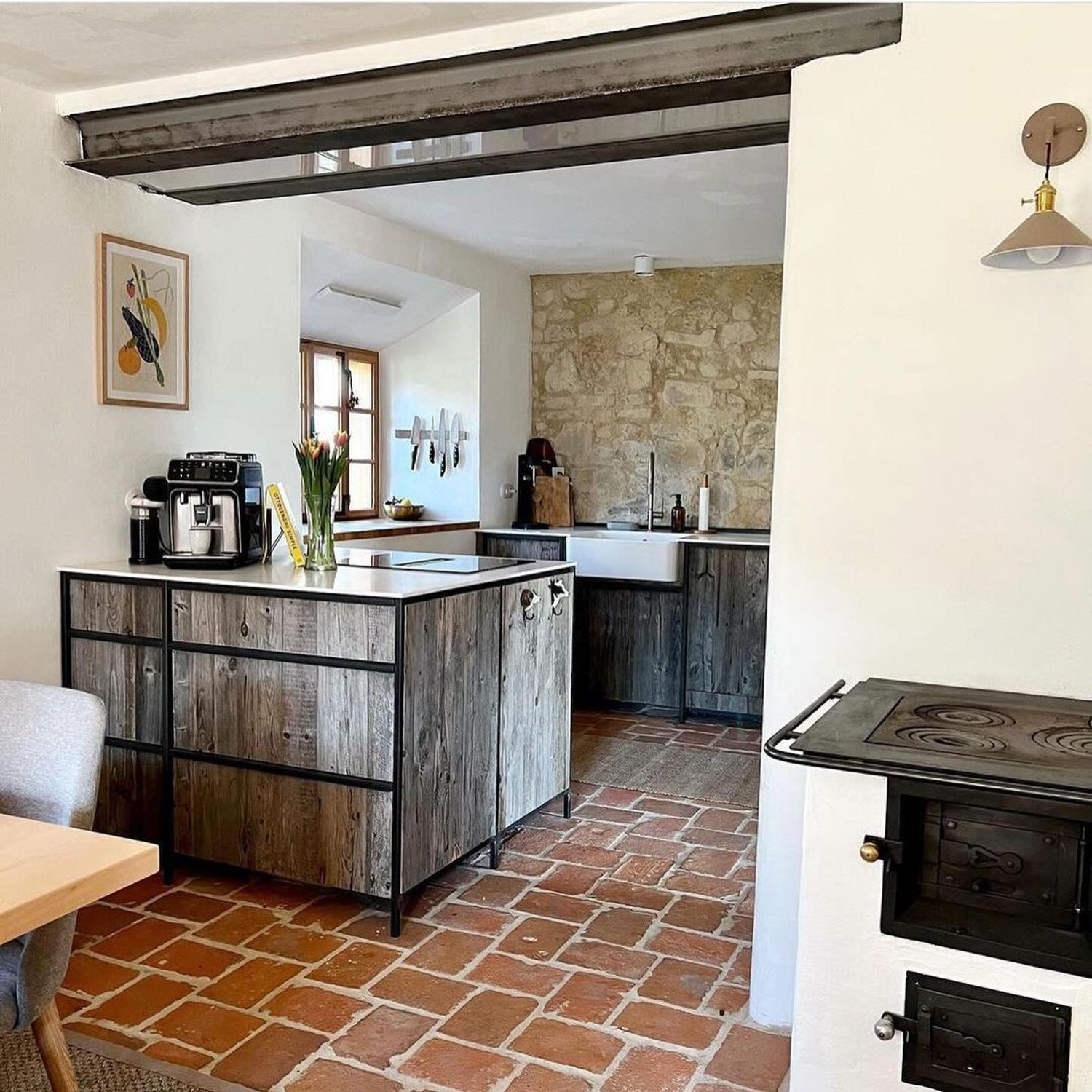 Rustic yet modern kitchen with terracotta tiles