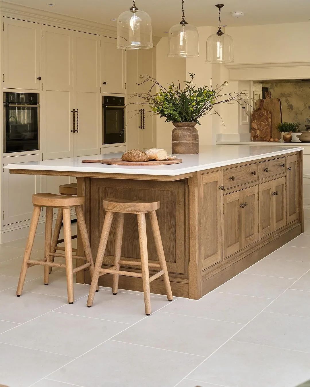 Warm and inviting traditional kitchen with a large wooden island