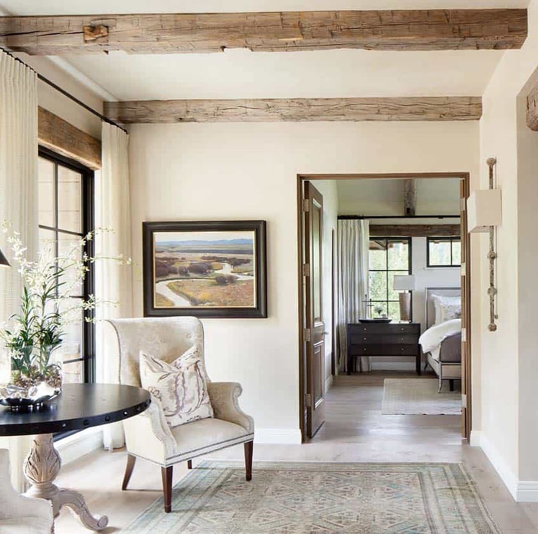 A serene transitional style foyer seamlessly connecting to a bedroom