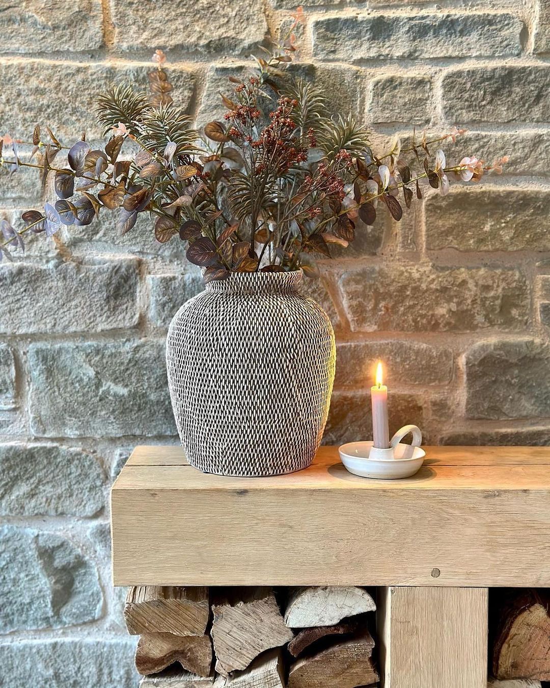 Cozy home atmosphere with dried flowers and candle