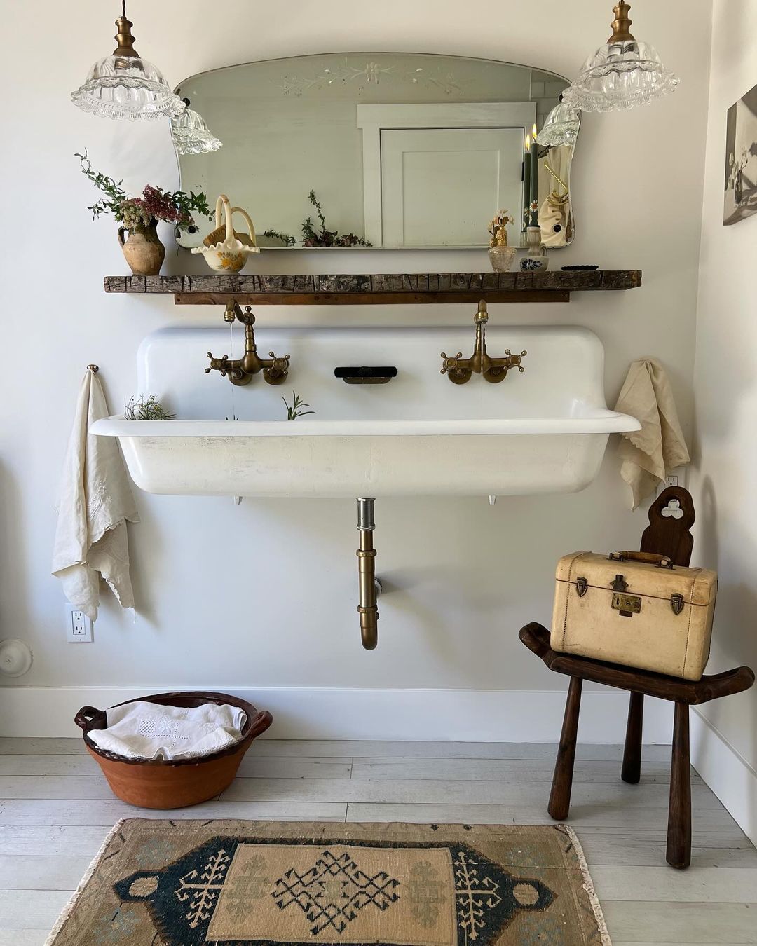 A vintage inspired bathroom with rustic accents