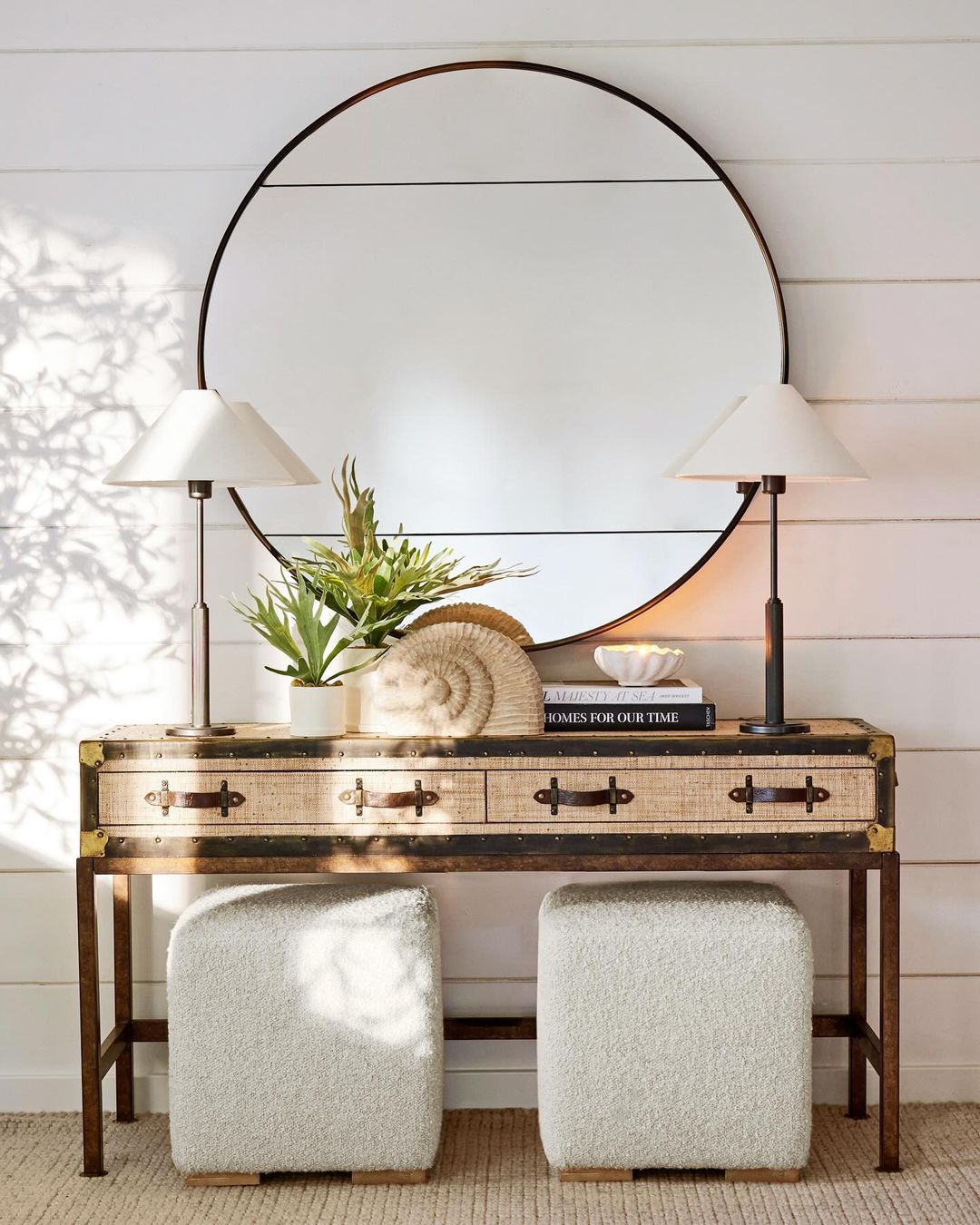 Stylish vintage vanity setup with a large round mirror