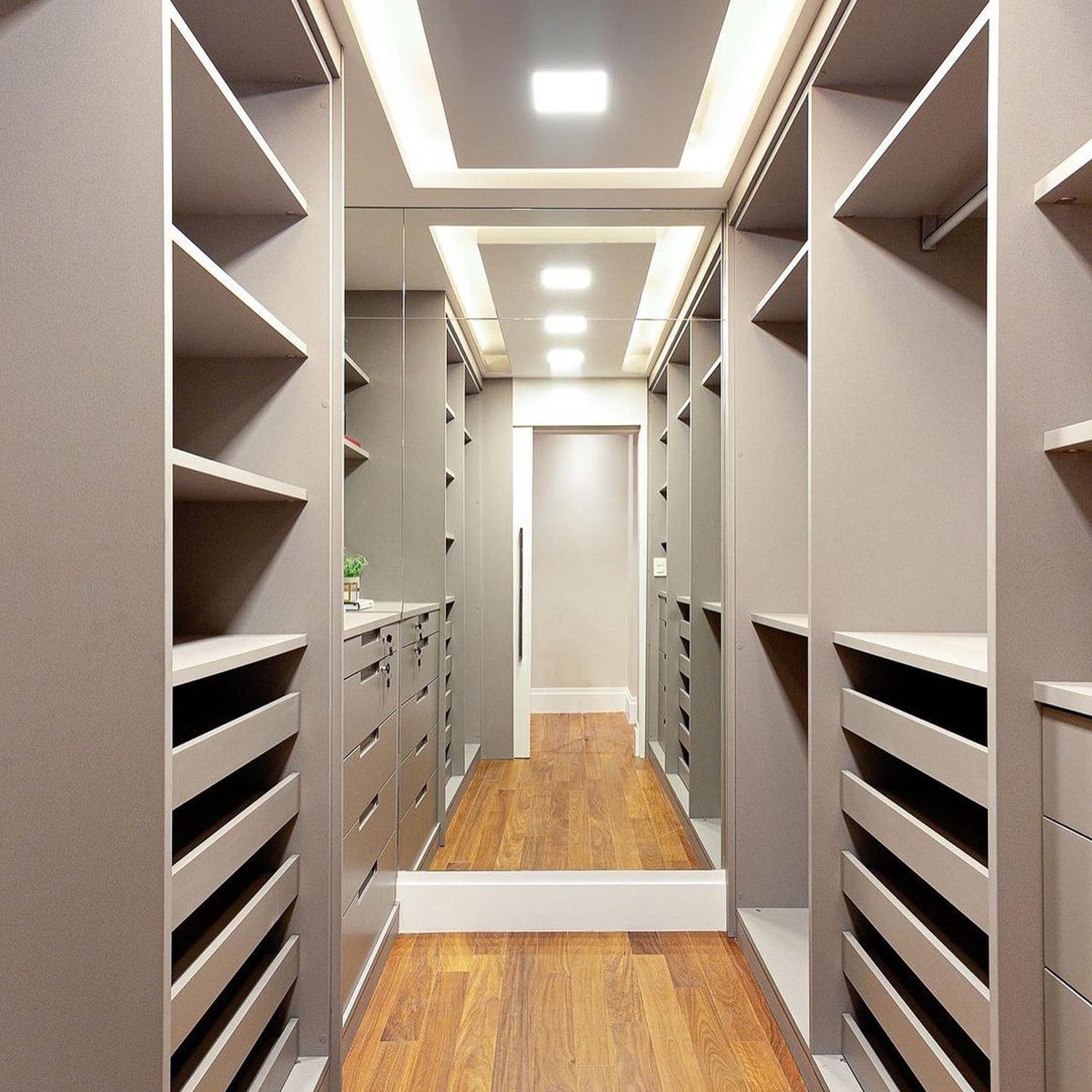 Elegantly designed walk-in closet with ample storage