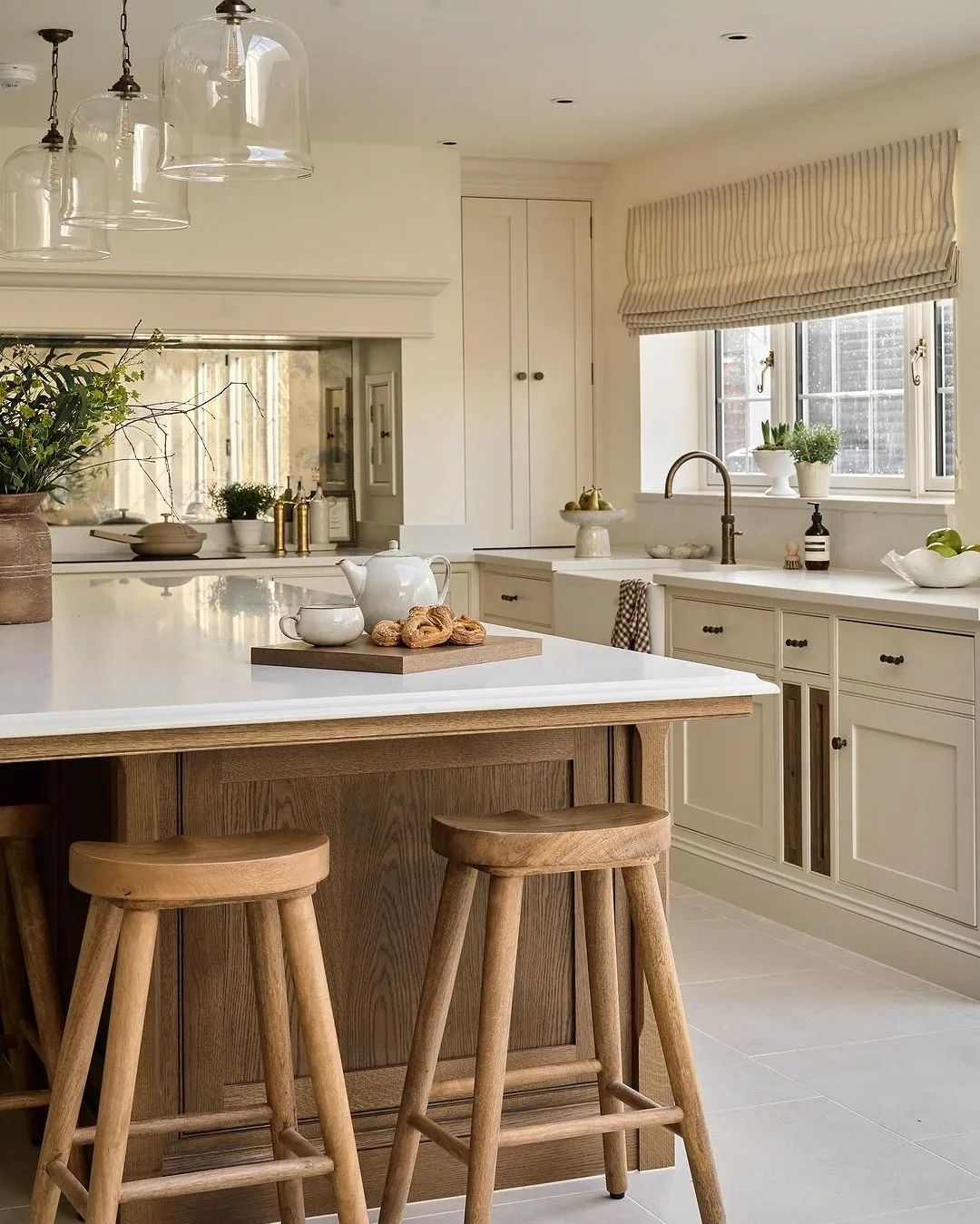 A tastefully designed kitchen featuring a mixture of textures and materials.