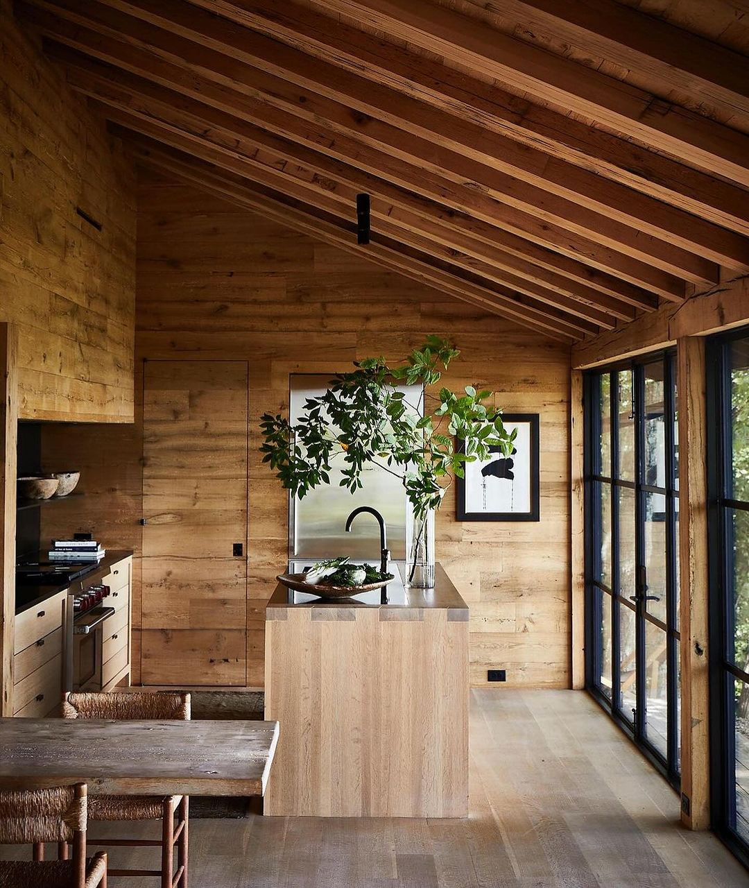 A warm and inviting kitchen showcasing natural wood textures and modern simplicity