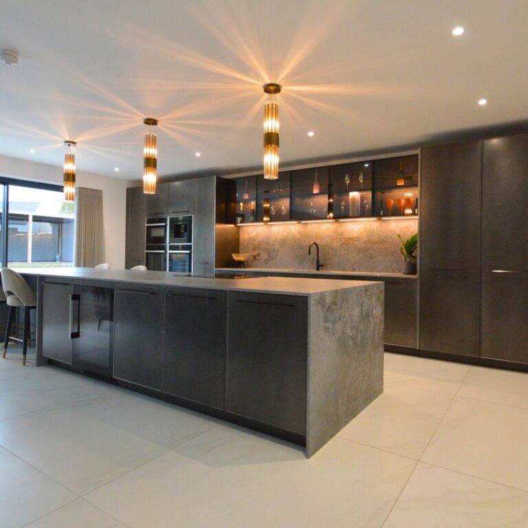 A stylish modern kitchen with sophisticated lighting