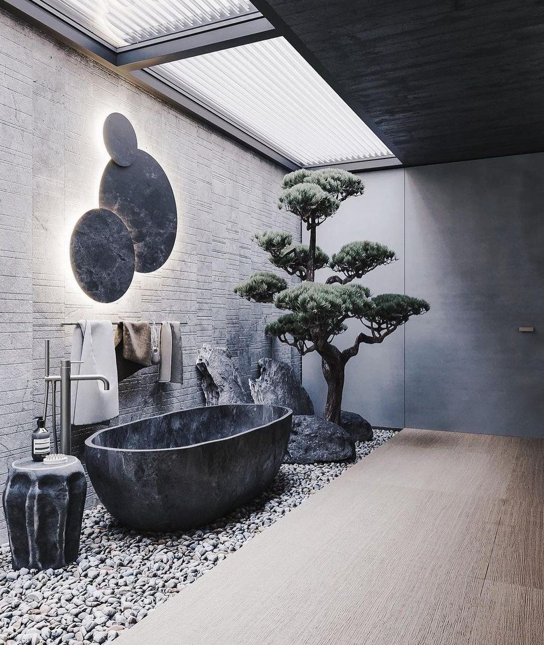 Zen-inspired bathroom with bonsai tree and unique bathtub